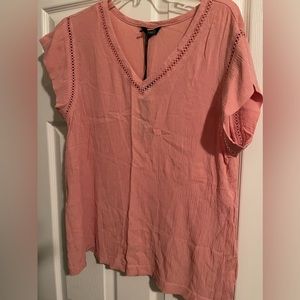 Peach color top, short sleeve never worn
